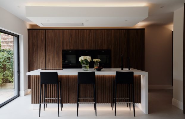 A bespoke kitchen in London featuring wooden cabinets.